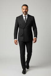 Man wearing black pinstripe double-breasted suit with tailored fit and elegant style.